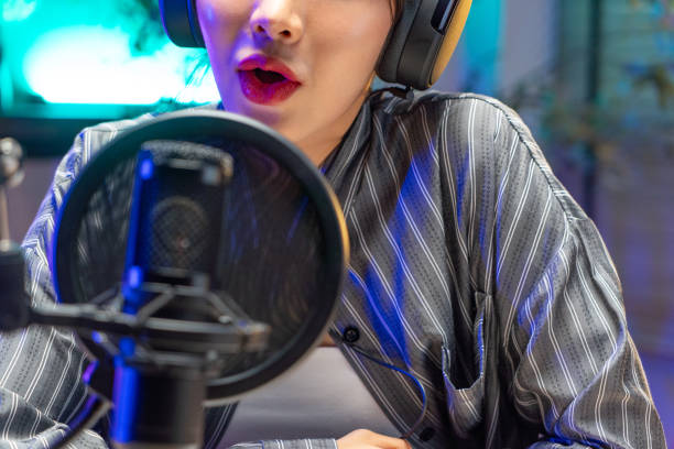 istock Asian woman live online podcast 2158692293