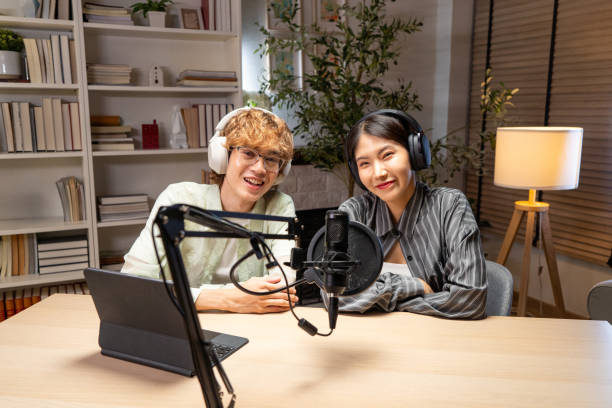 istock Portrait of two host show talking on podcast 2158692447