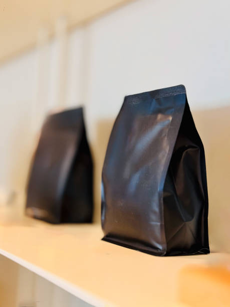Close up photo of roasted coffee beans in a sack