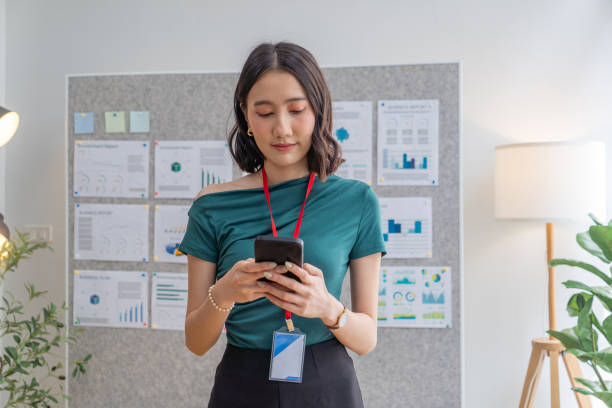 istock Businesswoman working on smartphone 2158693230