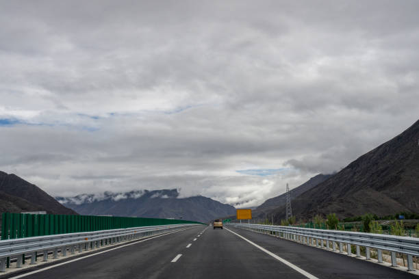 Plateau mountains and roads in cloudy weather