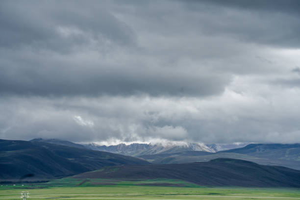 istock Grasslands and mountains in cloudy weather 2158698658