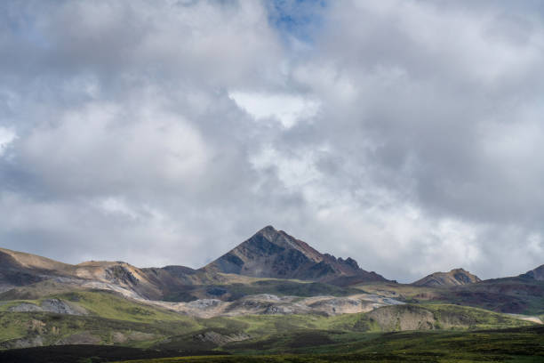 Grasslands and mountains in cloudy weather