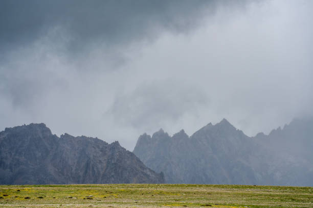 istock Grasslands and mountains in cloudy weather 2158699194