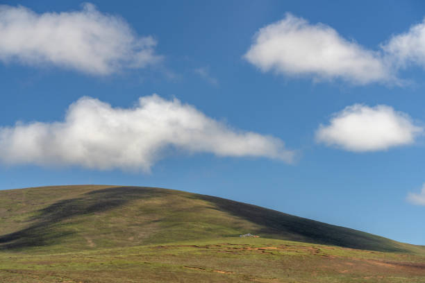 Plateau mountains and meadows under a sunny sky