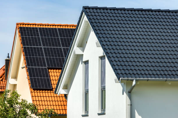 istock Houses with solar panels on a summer day 2158705023