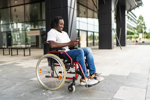 istock Smiling African American man using a smart phone outdoors 2158707128