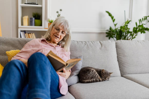 istock Charming Senior Woman Reading 2158711697