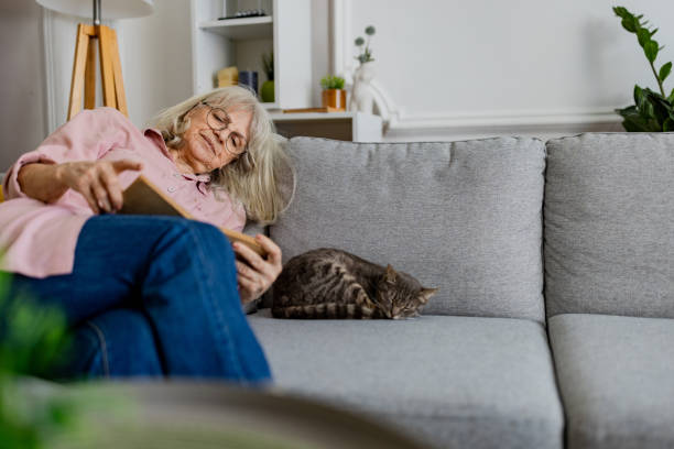 istock Senior Woman Reading a Book 2158711774