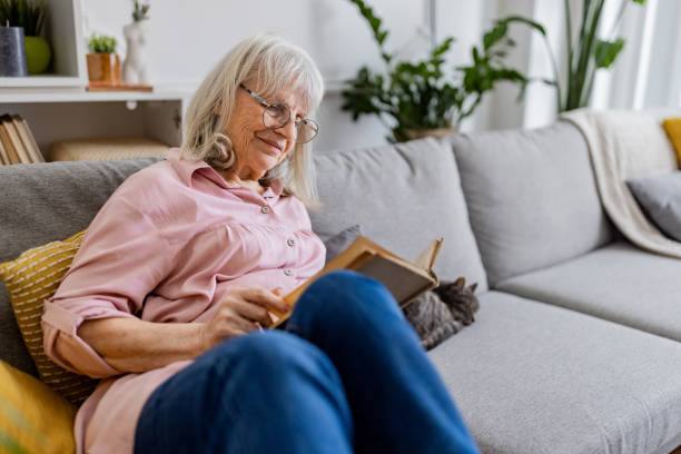 istock Senior Woman Reading a Book 2158711844