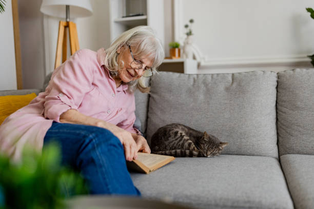istock Senior Woman Reading a Book 2158711944
