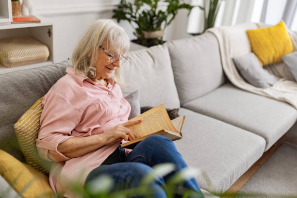 istock Senior Woman Reading a Book 2158711955