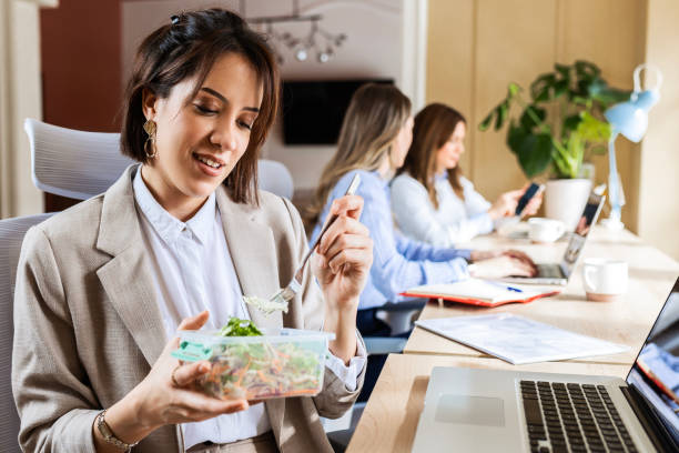 istock Young Woman Enjoying Her Meal 2158712215