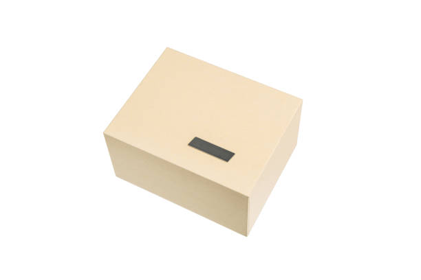 istock Simple but high-quality cardboard box. Gift wrapping with a metal label. Isolate on a white background. 2158713434