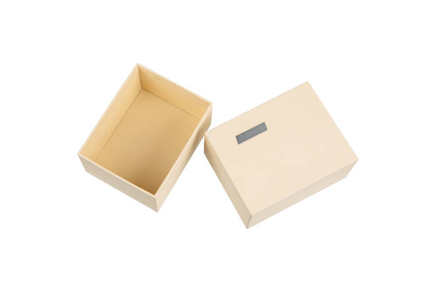 istock Simple but high-quality cardboard box. Gift wrapping with a metal label. Isolate on a white background. 2158713437