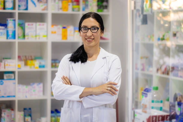 istock Cheerful pharmacist chemist woman 2158713644