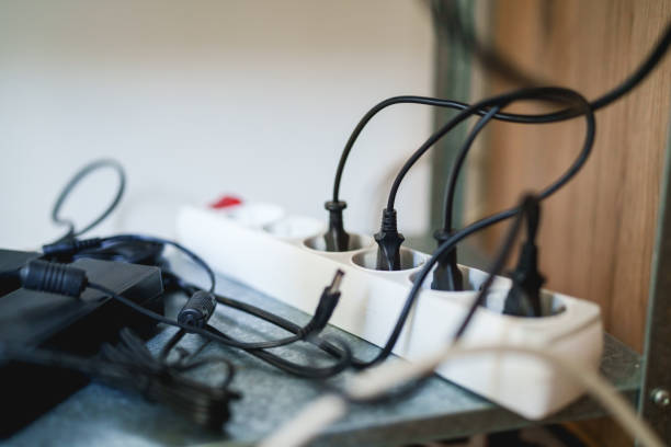 istock Messy cables plugged into the power strip 2158713890