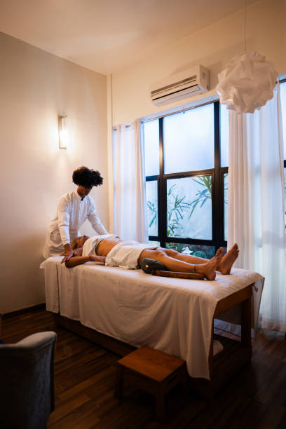istock Masseur doing belly massage on transgender female at spa 2158714469