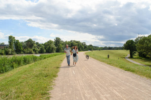 istock A mature couple runs on a towpath 2158715558