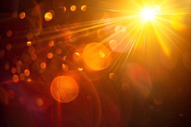 istock Abstract Natural Sun flare on the black 2158717683