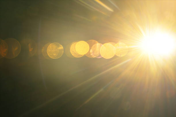 istock Abstract Natural Sun flare on the black 2158717692