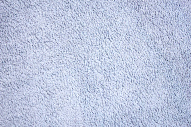 Blue fleece texture,background. Knitted fabric,clothing. Light blue,navy fabric.