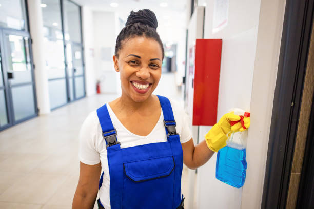 istock Female janitor cleaning the school building 2158718789