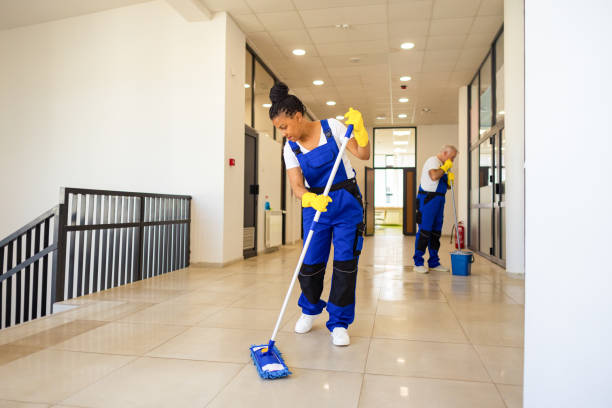 istock Janitors in blue Uniform cleaning the school floor 2158718851