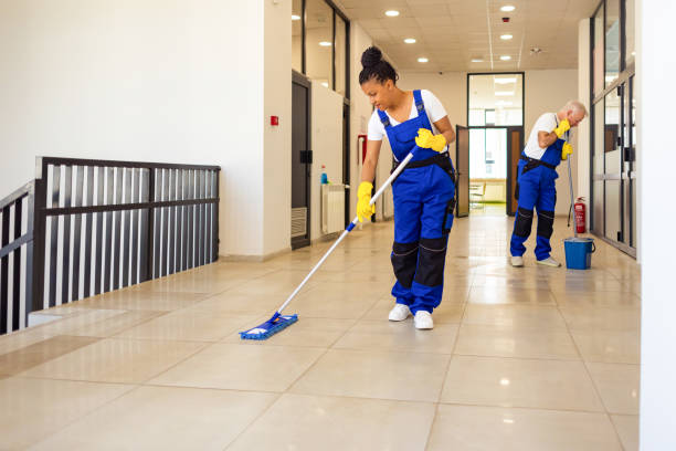 istock Janitors cleaning the  floor in school hallway 2158718891