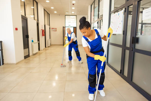 istock Janitors cleaning the  floor in school hallway 2158719471