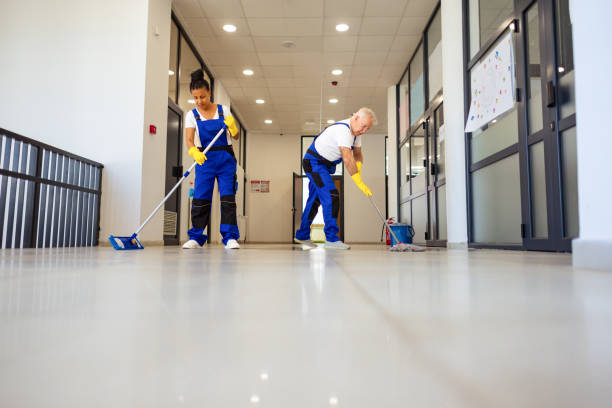 istock Janitors cleaning the  floor in school hallway 2158719554