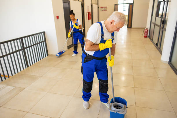 istock Janitors in blue Uniform cleaning the school floor 2158719698