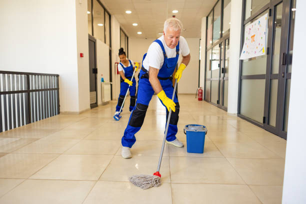 istock Janitors cleaning the  floor in school hallway 2158719717