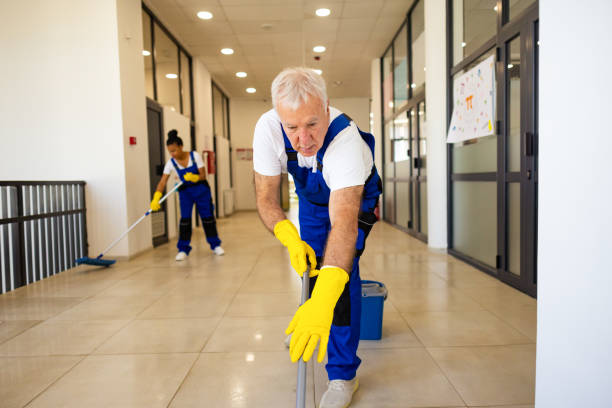 istock Janitors cleaning the  floor in school hallway 2158719855