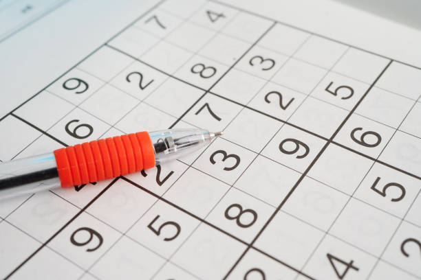 istock Sudoku puzzle, game to play for keep you brain younger for developing Alzheimer disease in senior patient. 2158722245