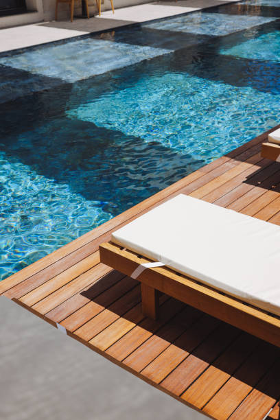 istock Beautiful palms and blue hotel pool 2158723292
