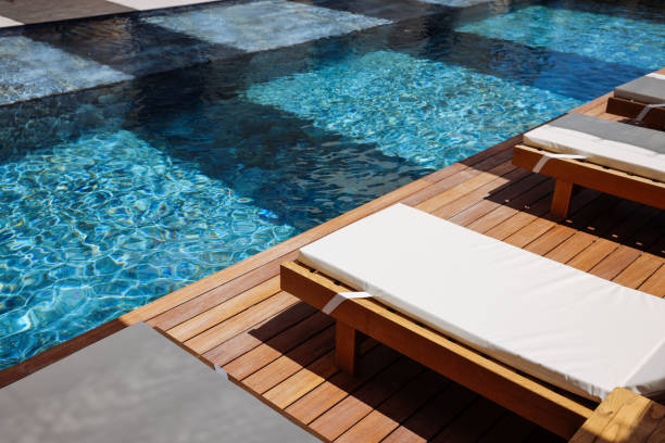 istock Beautiful palms and blue hotel pool 2158723497