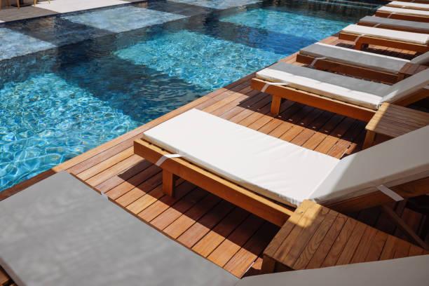 istock Beautiful palms and blue hotel pool 2158724263