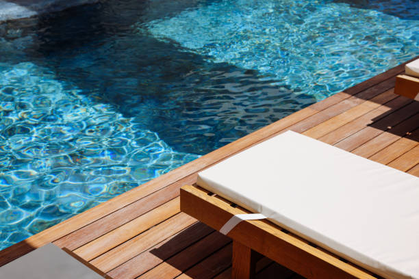 istock Beautiful palms and blue hotel pool 2158724453
