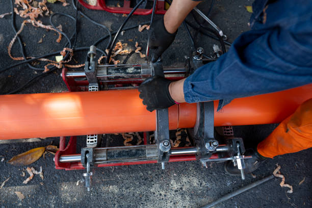 istock An engineering worker is repairing a pipeline on the roadside 2158727871