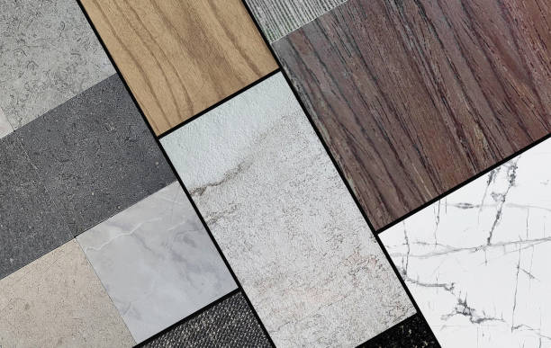 istock combination of palette interior material samples for mood board consists wooden veneers, stone ceramic tiles, white carrara marbl, oak wooden vinyl flooring, fabric laminated in close up view. 2158731523