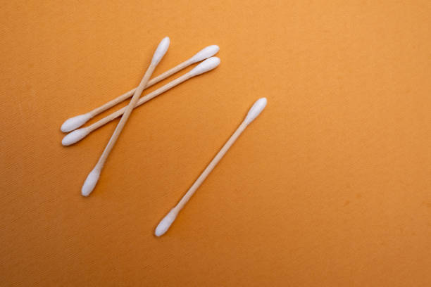 istock Bamboo cotton buds and cotton pads on a colored background. Biodegradable ear plugs. Eco product 2158735218