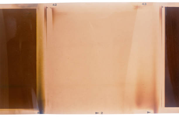 istock 120mm negative film with light leaks isolated on white 2158740849