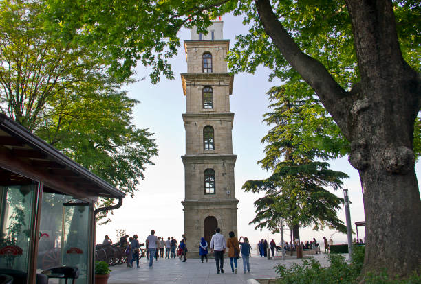 Bursa, Turkey - May 14, 2017: Osman gazi and Orhan gazi Tombs located in Tophane region in Bursa and there is a clock tover in tophane at Osmangazi Bursa Turkey. People visits Tophane to see tombs and clock tower which was built by ottomans.