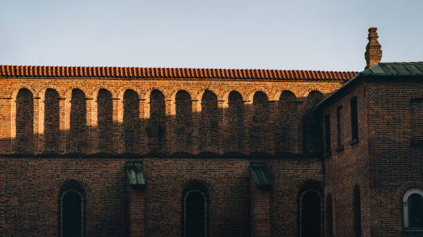 istock Brick facade with decorative arches, the old synagogue building in Krakow at sunset, Poland 2158744943