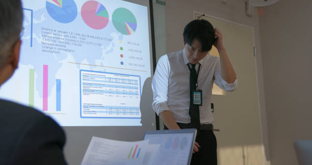 istock businessman do presentation in boardroom 2158747487