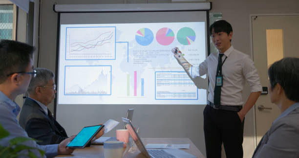 istock businessman do presentation in boardroom 2158747982