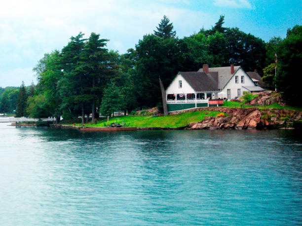 St Lawrence River's Thousand Islands, Canada and United States of America, small Islands on Saint Lawrence River. Residential cottage.