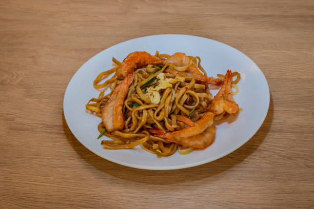 istock Shrimp with noodles in Chinese restaurant 2158750146