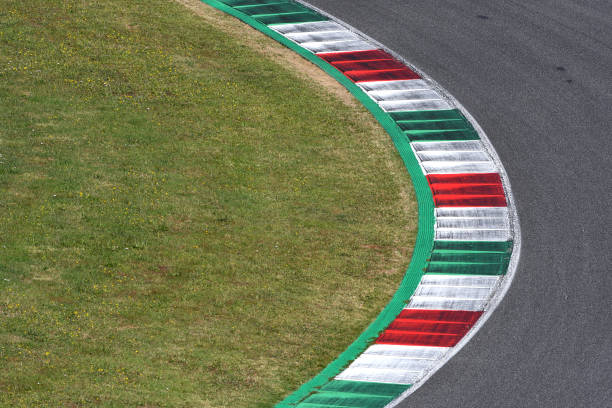 istock colored curb on a racing track 2158751360
